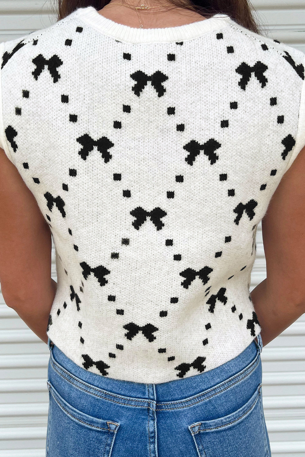 White Bow Pattern Buttoned Side Knit Top