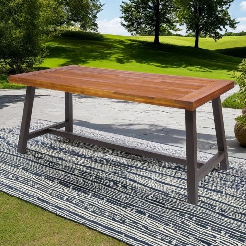 Carlie Outdoor Sandblast Finished Dining Table With Rustic Metal Finished Iron Legs